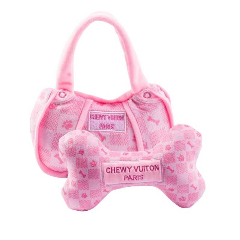Unleash your dog's inner Dog Diva with our Pink Checker Chewy Dog Toy Gift Set. Give your furry friend the ultimate stylish playtime: Made with a soft plush fabric and squeaker. 