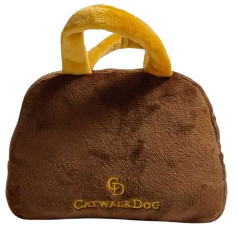 Does your dog diva love to adorn themselves in the latest luxury fashion accessories? Then look no further, we have the ultimate gift for your pooch the Chewy Louis Handbag Plush Dog Toy.