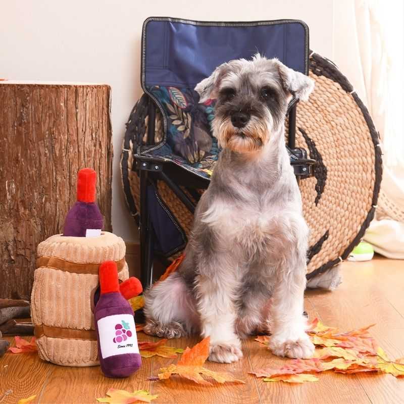 The Wine Barrel Burrow Plush Dog Toy includes the finest wines for your boozy hound to play with.  Keep your pooch busy and let them have a fun time trying to figure out how to remove the three squeaky wine bottle toys. 