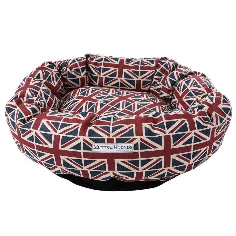 Union Jack Donut Dog Bed. Prepare your dog for a comfy night's sleep with our Union Jack Donut Dog Bed.  This fabulous Union Jack range will make your pooch feel like a Royal.  Perfect for dogs that love to curl up while sleeping!
