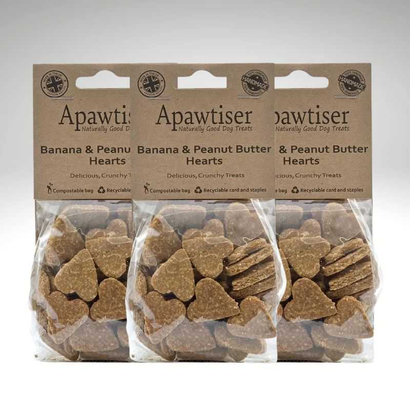 These Apawtiser Banana & Peanut Butter Hearts are a delicious crunchy oat flour dog biscuit. A wholesome healthy treat full of fibre and great for dogs with wheat intolerances.