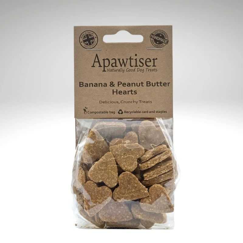 These Apawtiser Banana & Peanut Butter Hearts are a delicious crunchy oat flour dog biscuit. A wholesome healthy treat full of fibre and great for dogs with wheat intolerances.