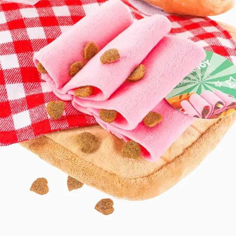 The Dog Snuffle Mat Charcuterie Board will provide mental stimulation for your dog.  Includes a slice of squeaky bread, a croissant and a ham treat hiding spot. Hide some treats inside the ham to start the sniffing game. 
