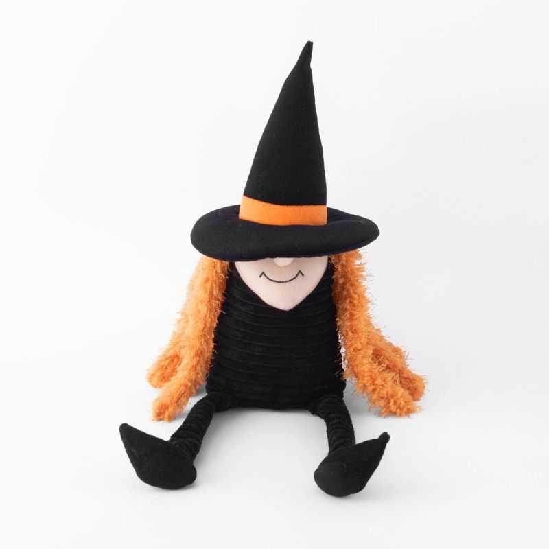 The Halloween Witch Dog Toy will provide hours of spooky fun. This witch has a squeaker in the body and features crinkly arms and legs, adding engaging textures to playtime. 