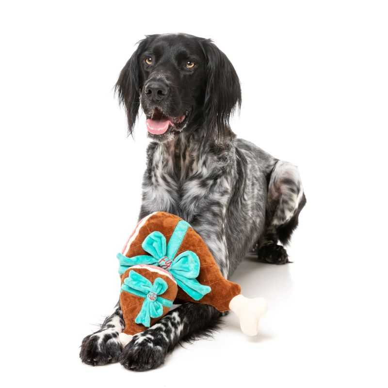 Fuzzyard Humble Holiday Ham Dog Toy strikes the perfect balance - not too big or not too small. Get your four-legged friend into the holiday spirit with this Christmas-themed dog toy. 