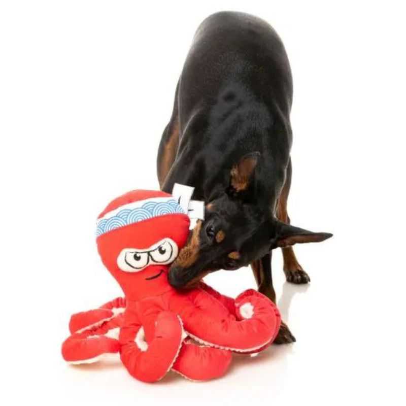 Meet the Takoyaki Dog Toy affectionately known as the Octo-Posse Chef. With its many vibrant, wiggly arms this toy will undoubtedly stir up excitement in your four-legged friend. 