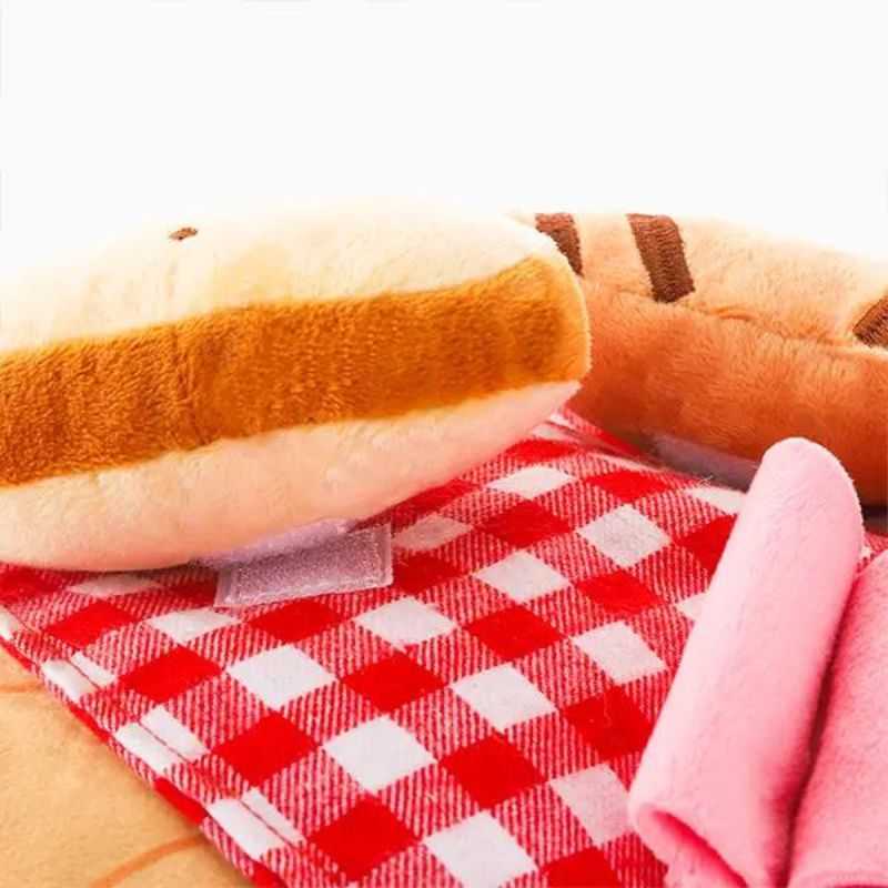 The Dog Snuffle Mat Charcuterie Board will provide mental stimulation for your dog.  Includes a slice of squeaky bread, a croissant and a ham treat hiding spot. Hide some treats inside the ham to start the sniffing game. 