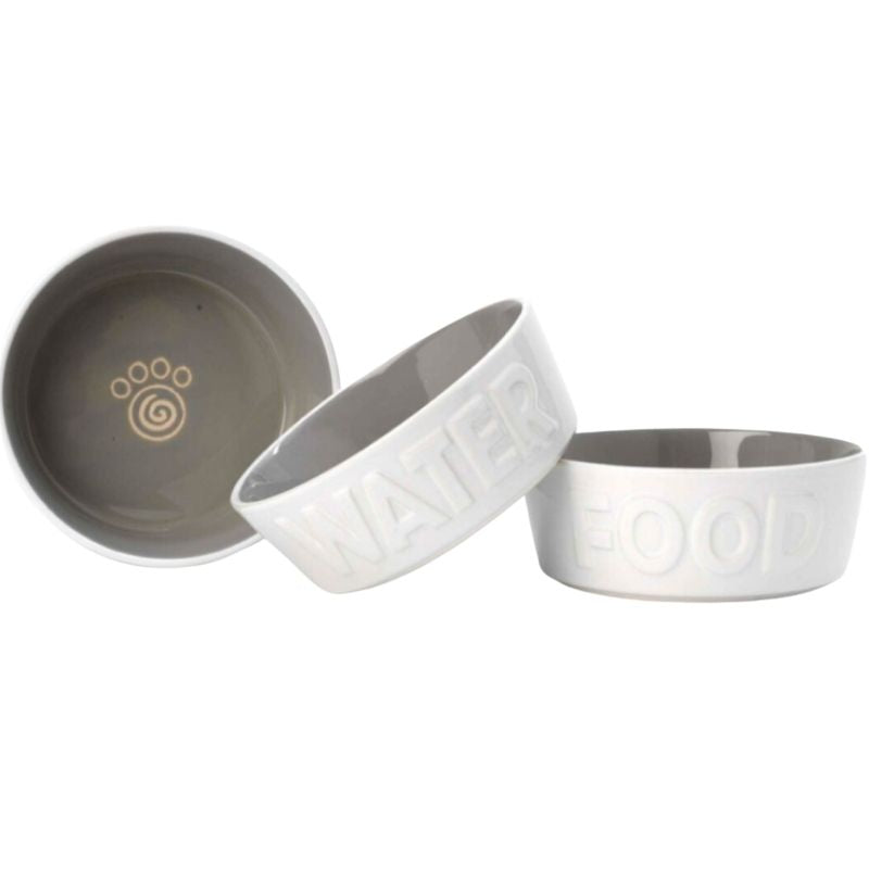 These Back to Basics Dog Bowls have solid white embossed lettering on the exterior, with the word FOOD and WATER. It also features, a grey interior with a paw print design. This stylish design would suit a traditional or contemporary kitchen with home interiors in mind.