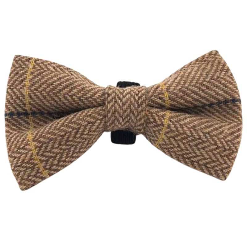 This Caramel Tweed Dog Bow Tie is truly pawesome and made from top-quality materials. Designed to slide snuggly onto your dog’s collar and remain in place throughout the day's activities.  A dog bow tie can add the perfect finishing touch to your dapper dog’s daytime apparel. 