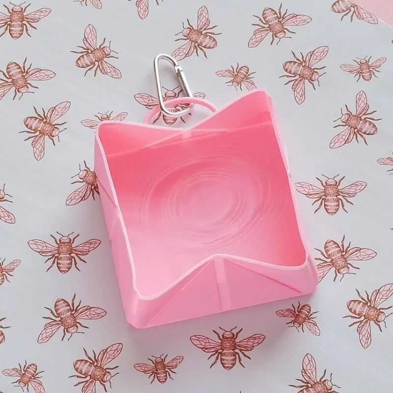 This Pink Foldable Travel Bowl is perfect for keeping your dog hydrated whilst on their walks. A stylish practical dog bowl that can also be used for feeding small dogs when you are out visiting friends & family.