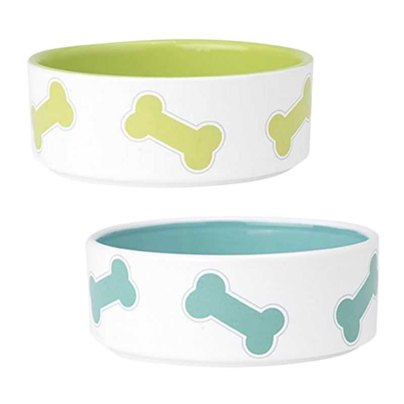 Kool Bones Dog Bowls. These Kool Bones Dog Bowls feature a white exterior and lime green or turquoise bone design. These bowls are available in 2 sizes small and medium and would be ideal in a modern contemporary kitchen.