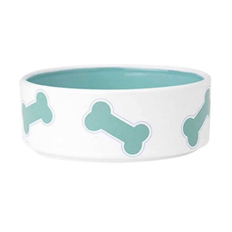The Kool Bones Turquoise Dog Bowl features a white exterior with a turquoise dog bone design wrapped around the exterior.