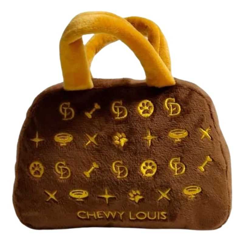 Does your dog diva love to adorn themselves in the latest luxury fashion accessories?  Then look no further, we have the ultimate gift for your pooch the Chewy Louis Handbag Plush Dog Toy.