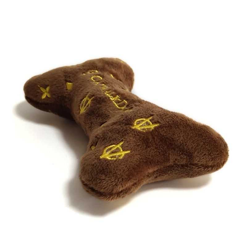 The ultimate in pooch fashion, the Chewy Louis Bone Plush Dog Toy.  Give your pup the style status that they deserve with our fun novelty Pet toy.
