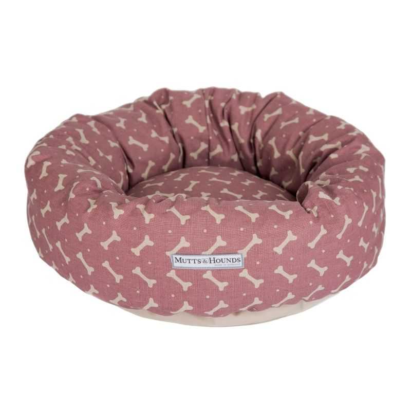 Linen Bones Donut Dog Bed. Let your dog cuddle up and relax in this beautiful Linen Bones Donut Dog Bed. It is super comfy and perfect for dogs that love to curl up whilst they sleep!  Made using a natural cotton canvas fabric with a cute bone print design.