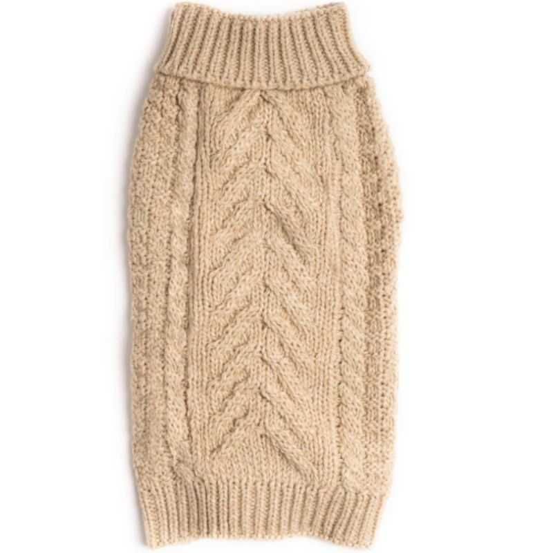 This Oatmeal Chunky Knit Dog Jumper is an essential piece of canine attire, ideal for those cold frosty mornings.  This turtleneck jumper is a timeless classic and can the scruffiest dog into the stylish of hounds.