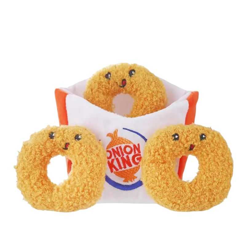Serve up some fast food playtime with our Onion Ring Dog Toy. Three crinkly onion rings stuffed into a crinkled effect bag. These sound effects create more excitement for your dog. You can also hide some treats inside the bag for some more added fun.