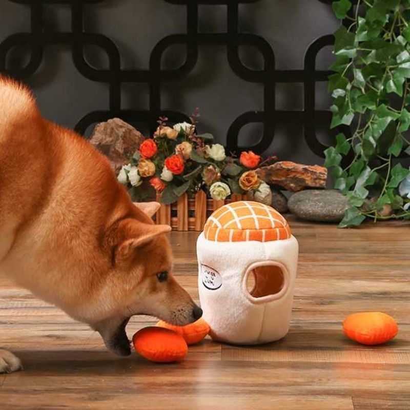 The Orange Jam Pot Burrow Plush Dog Toy will provide hours of interactive play for your pet.  Keep your pooch busy and let them have a fun time trying to figure out how to remove the three squeaky orange toys.