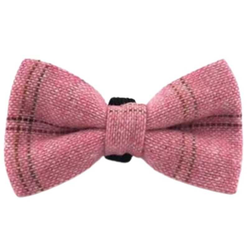 This Pink Tweed Dog Bow Tie is truly pawesome and made from top-quality materials. Designed to slide snuggly onto your dog’s collar and remain in place throughout the day's activities.  A dog bow tie can add the perfect finishing touch to your dapper dog’s daytime apparel. 
