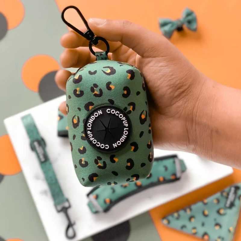 This Khaki Leopard Poop Bag Holder is super cute. Picking up poop isn't the most pleasant job to do but having stylish accessories on your dog walk does help!