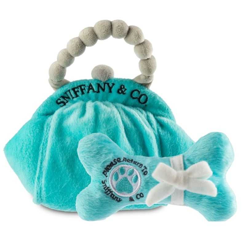 It's time to update your dog's toy box with the Sniffany and Co Handbag and Bone Dog Toy Gift Set.
