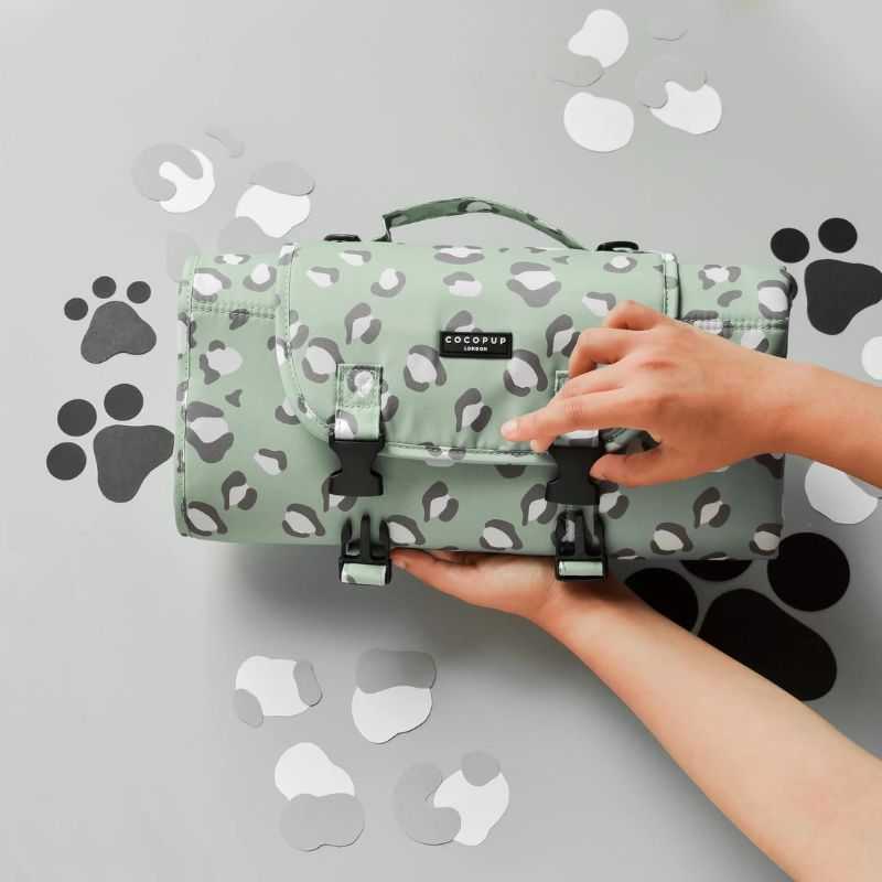 Our Sage Leopard Travel Set will keep your pup cosy, clean and stylish too.  The Dog Travel Mat has many uses, It protects your car, and you can take it with you when visiting friends.  It's also Ideal to take on days out with your dog, such as a picnic, to the seaside or even to your favourite café.  Whilst the Blanket provides that extra touch to keep your pup cosy and warm. It's super soft with a fluffy lining