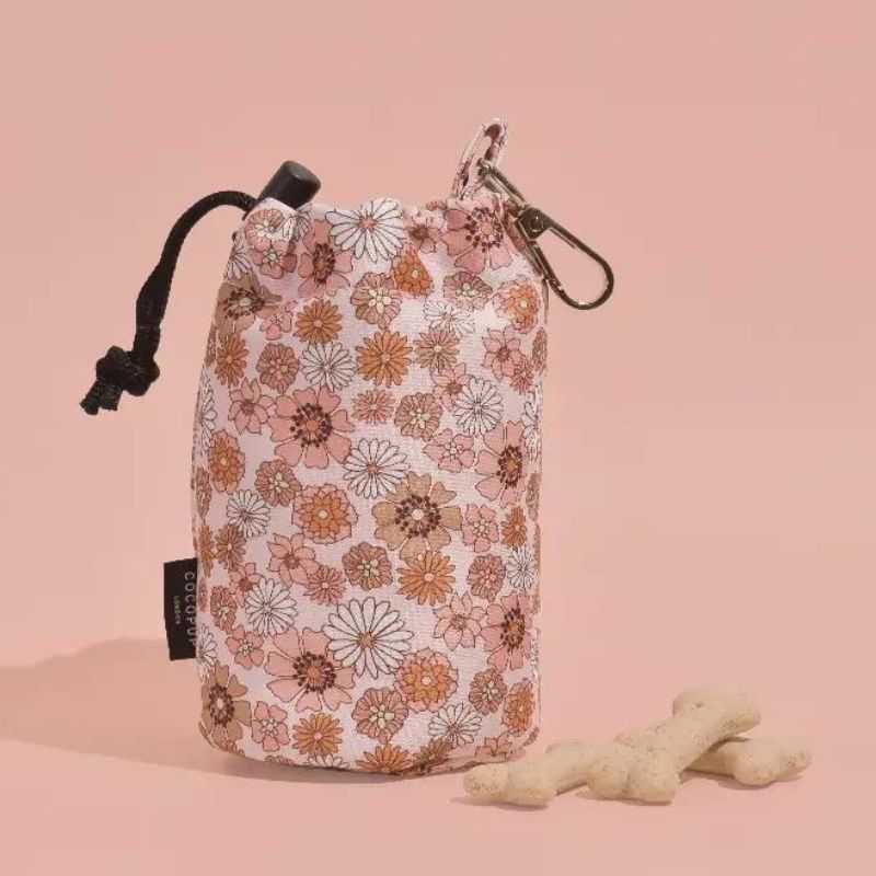 Our adorable Drawstring Treat Pouches are available in a variety of designs.  The perfect pouch for keeping your pup in check. Whether you're training or want to reward your dog for being well-behaved.