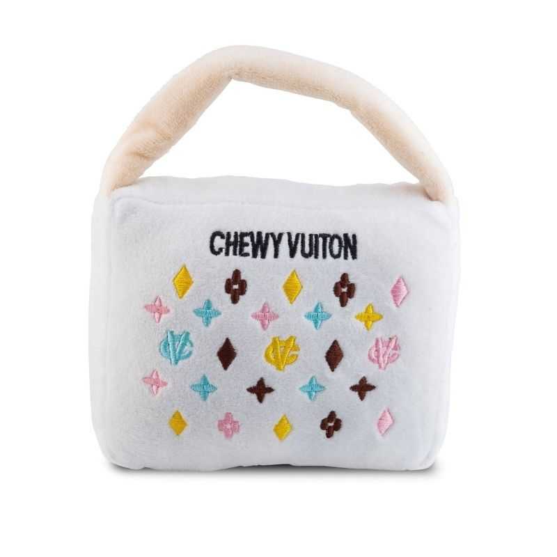 It's time to update your dog's toy collection with the Designer White Chewy Handbag Dog Toy.