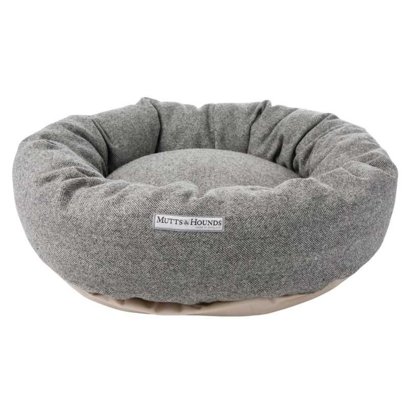 Grey Tweed Donut Dog Bed. Our stylish Grey Tweed Donut Dog Beds are for dogs who deserve the best.  A beautiful Grey Herringbone weave tweed crafted in Yorkshire woollen mills since 1837. Made to the highest quality and designed to last.