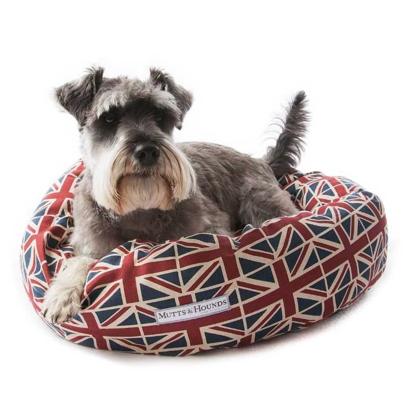 Union Jack Donut Dog Bed. Prepare your dog for a comfy night's sleep with our Union Jack Donut Dog Bed. This fabulous Union Jack range will make your pooch feel like a Royal. Perfect for dogs that love to curl up while sleeping!