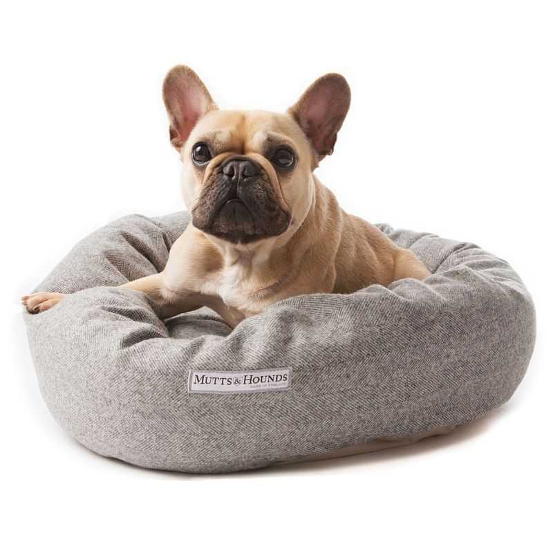 Grey Tweed Donut Dog Bed. Our stylish Grey Tweed Donut Dog Beds are for dogs who deserve the best. A beautiful Grey Herringbone weave tweed crafted in Yorkshire woollen mills since 1837. Made to the highest quality and designed to last